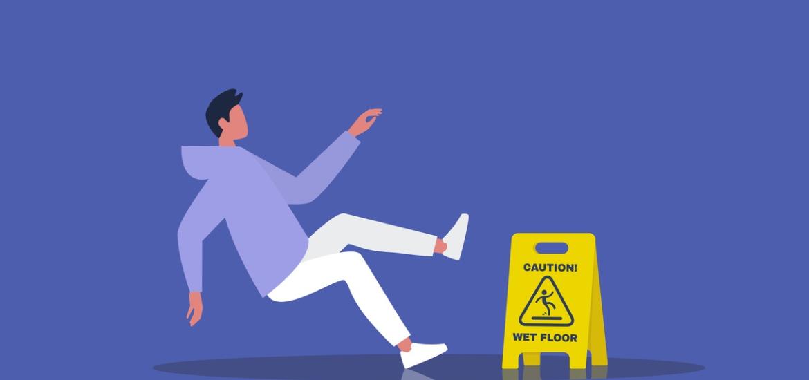 Cartoon of man slipping on wet floor