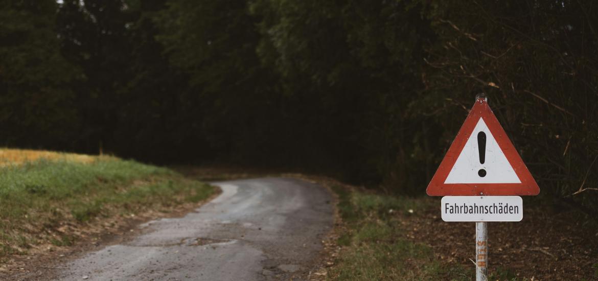 warning sign road red triangle exclamation mark